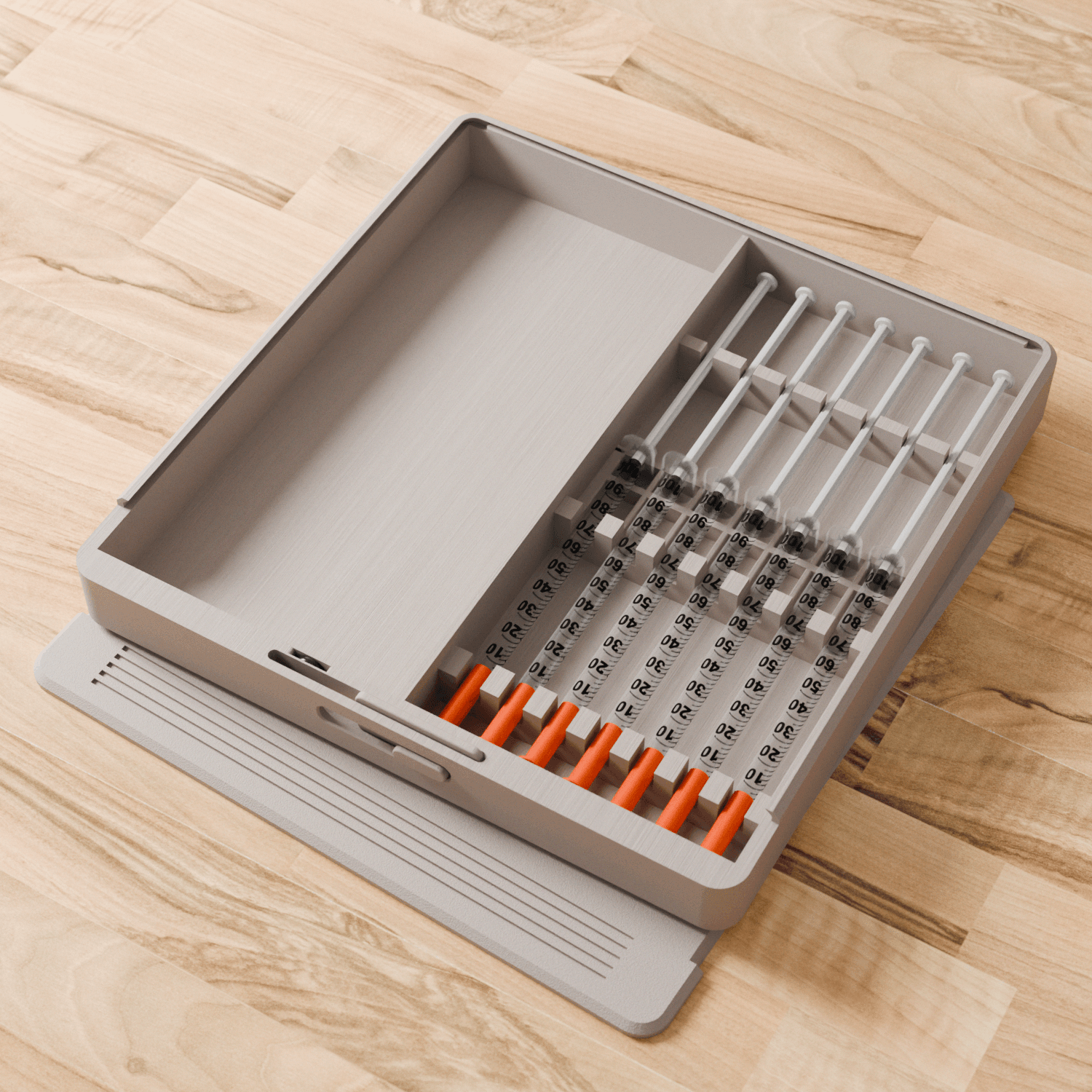 Open organizer case with insert and syringes