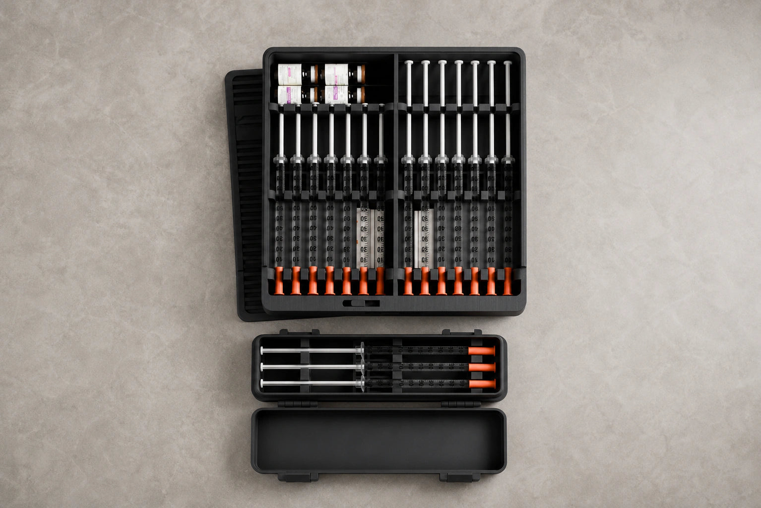 Overhead view of the loaded Routine Box organizer and open travel case